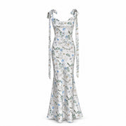 THE PHOENIX GOWN WITH LONG SHOULDER BOWS